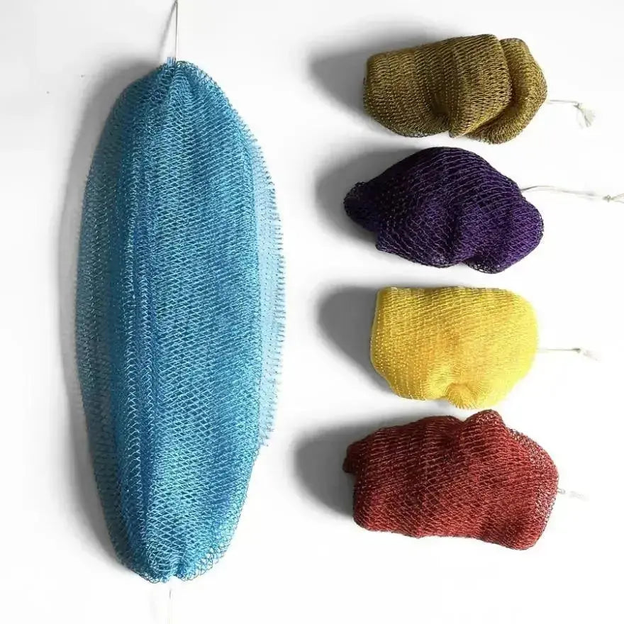 Four authentic African net sponges in blue, purple, yellow and red, ready for daily exfoliation