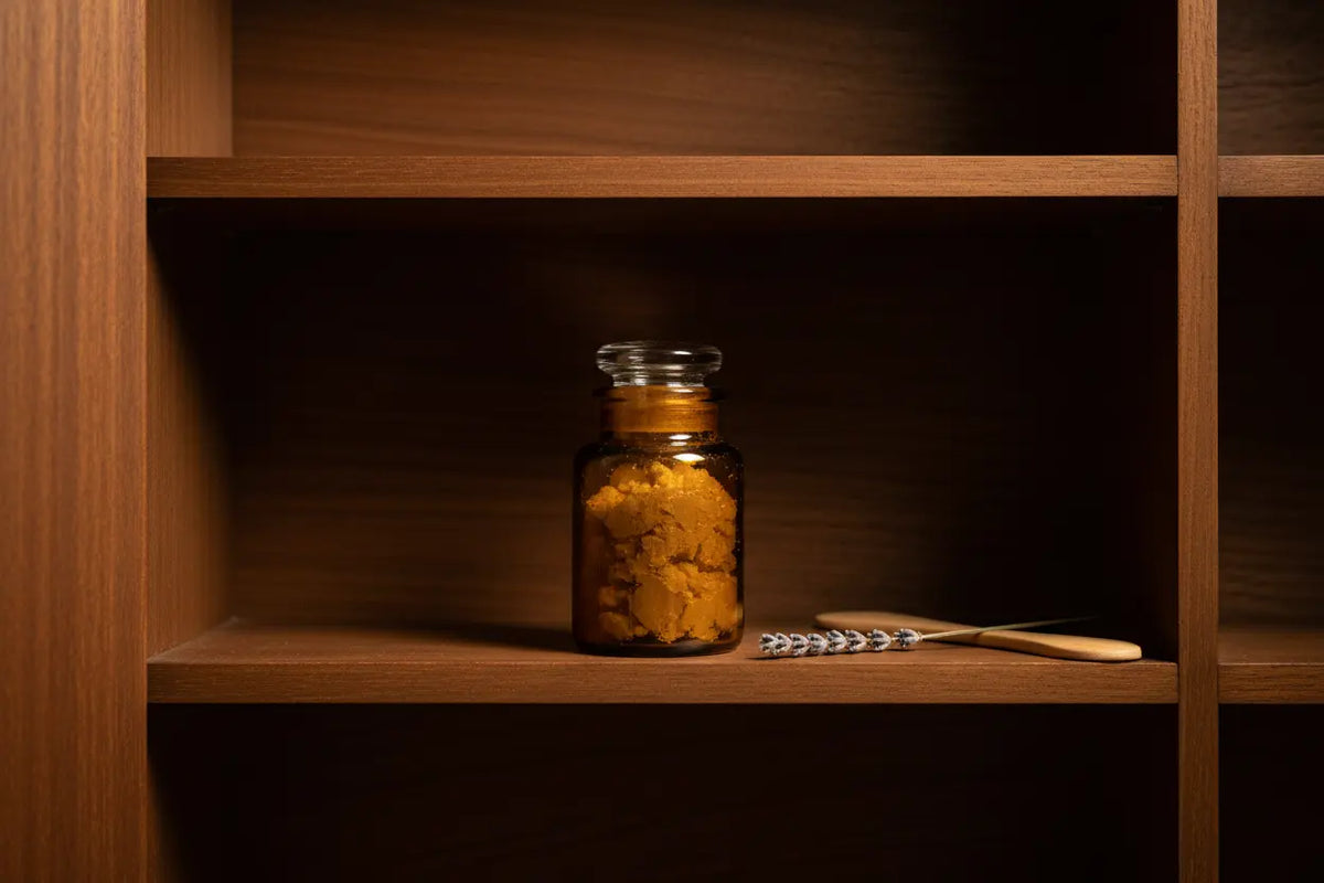 Properly storing raw shea butter organic in a cool, dark cabinet to prevent it from going bad.
