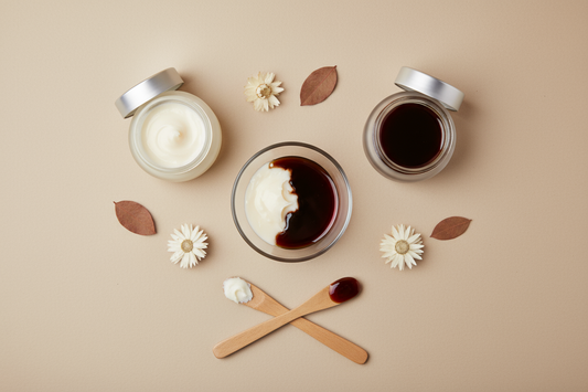 A DIY hair mask being made in a bowl with unrefined shea butter and pure batana oil to stop breakage.